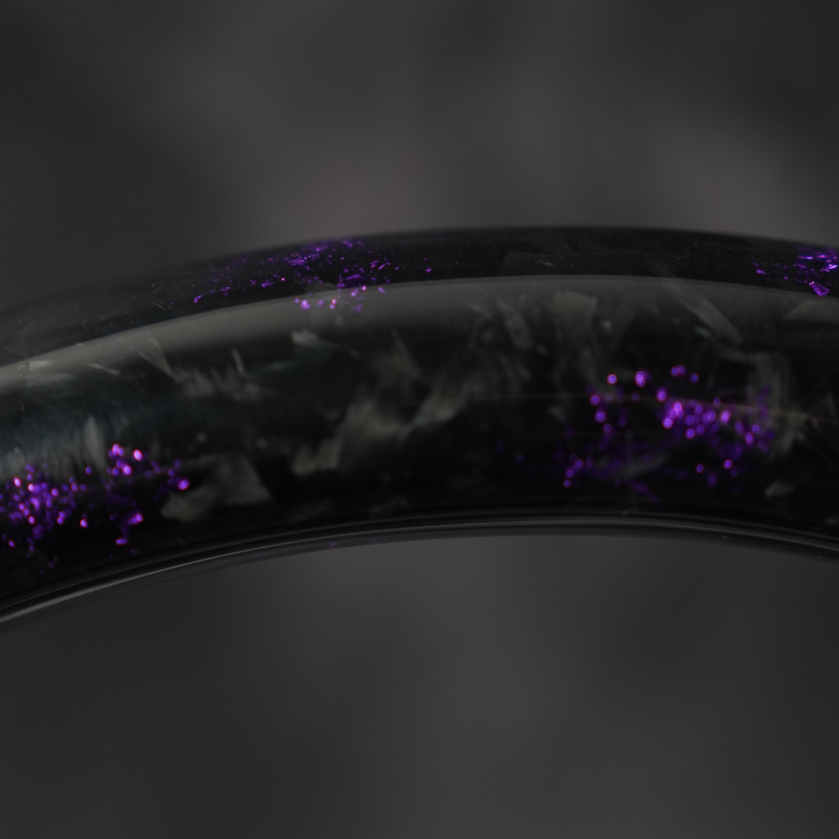 Forged carbon steering wheel rim with purple flake
