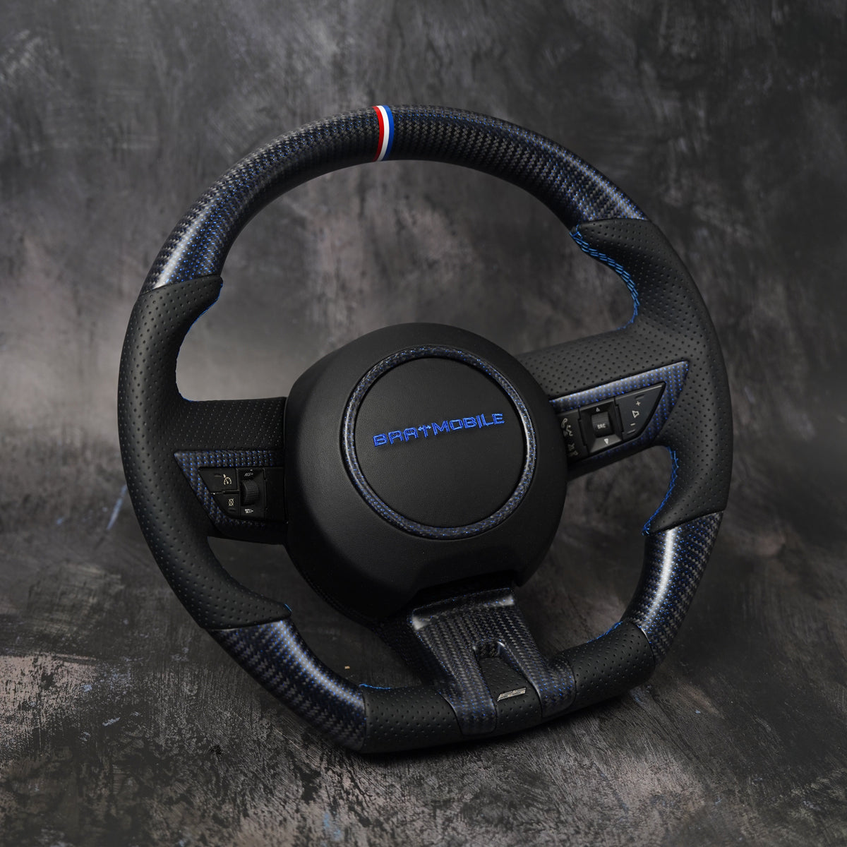 Custom Chevrolet Camaro steering wheel with blue stitching