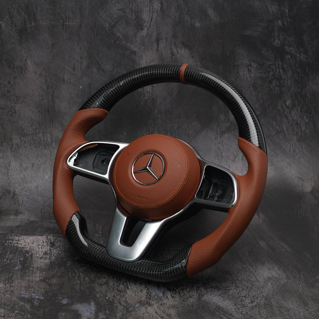 Custom Mercedes-Benz steering wheel in tan leather and carbon fiber